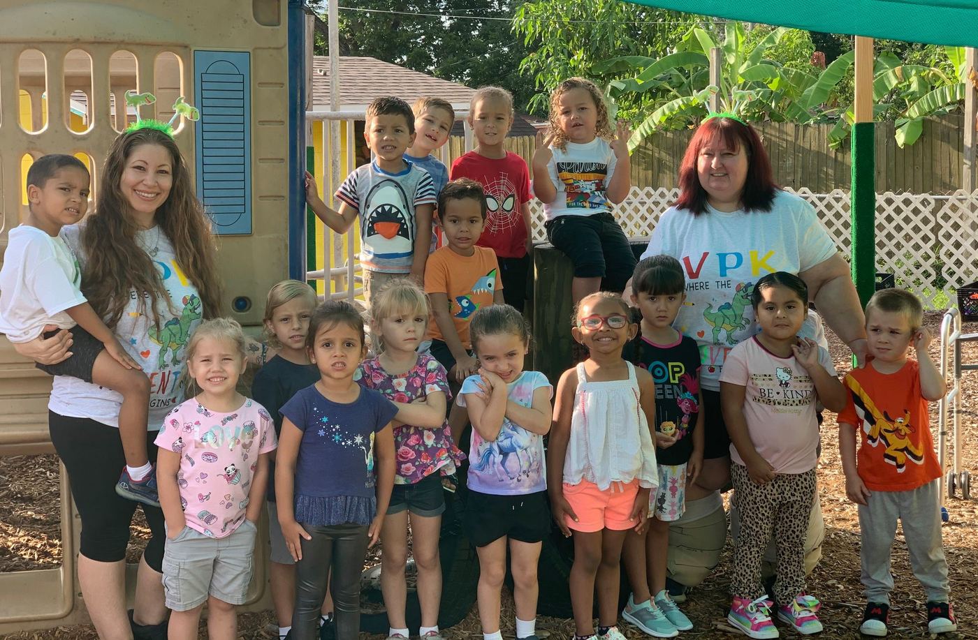 Children and teachers of A Child's Galaxy Preschool together on the playground
